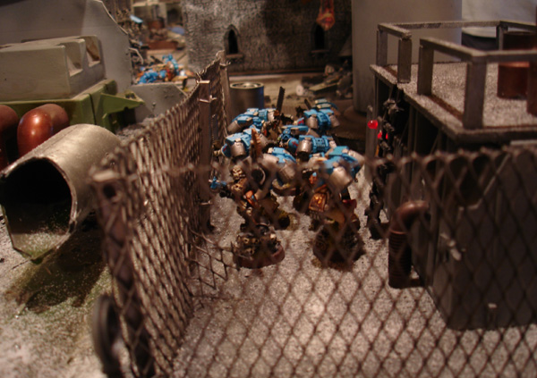 The Assault Squad prepares to jump the fence and engage the enemy..