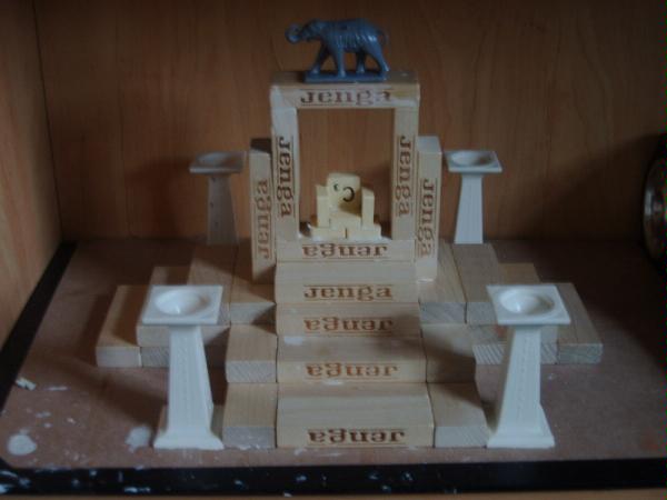 Using simple scrap material (such as old game pieces, board and decorations) this WIP begins to take shape.